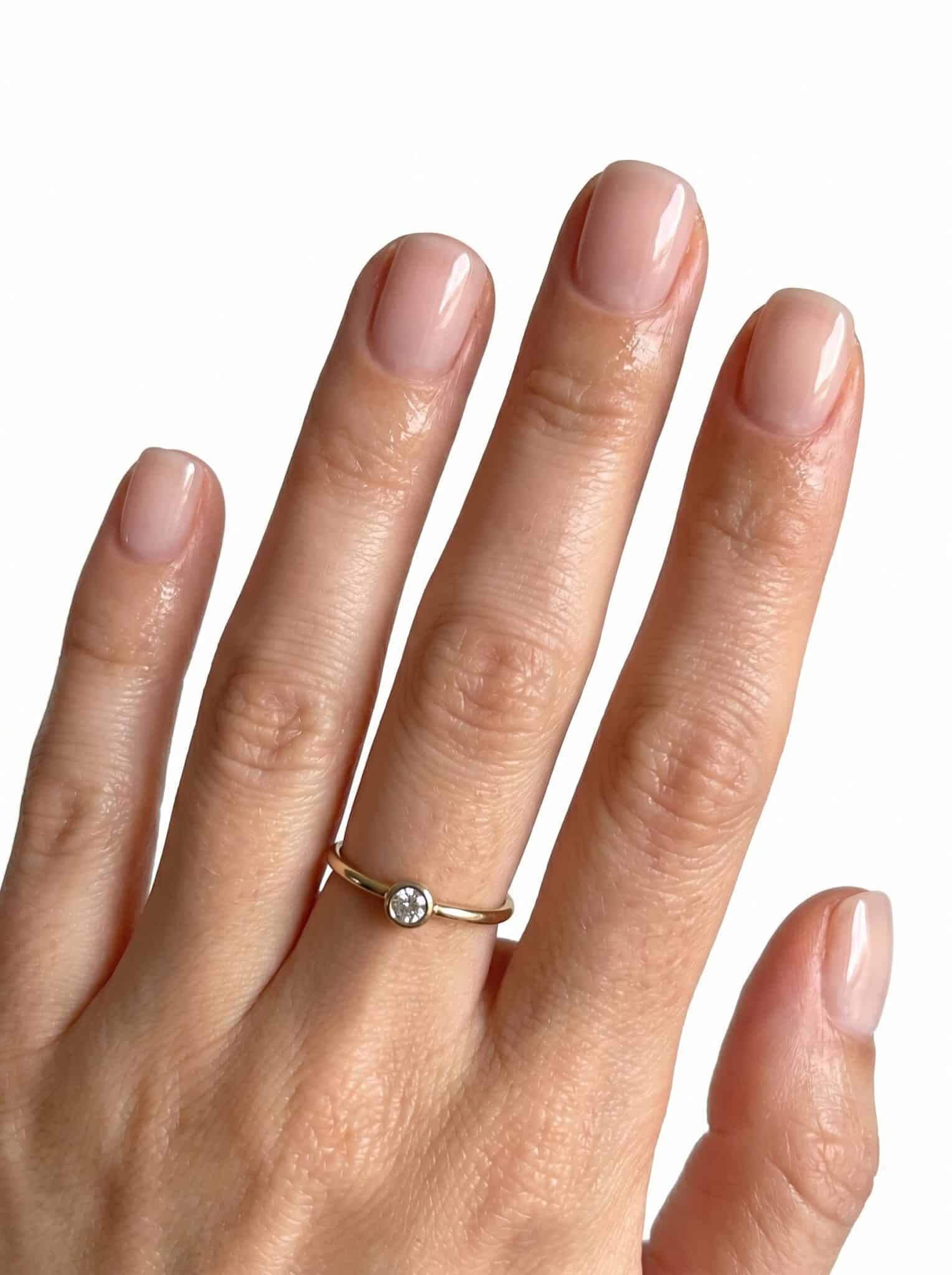 Natural short nails with fine sky blue micro French tips