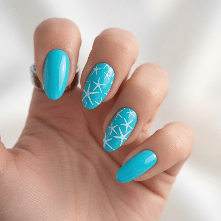 Vibrant blue summer nails decorated with white starfish accents