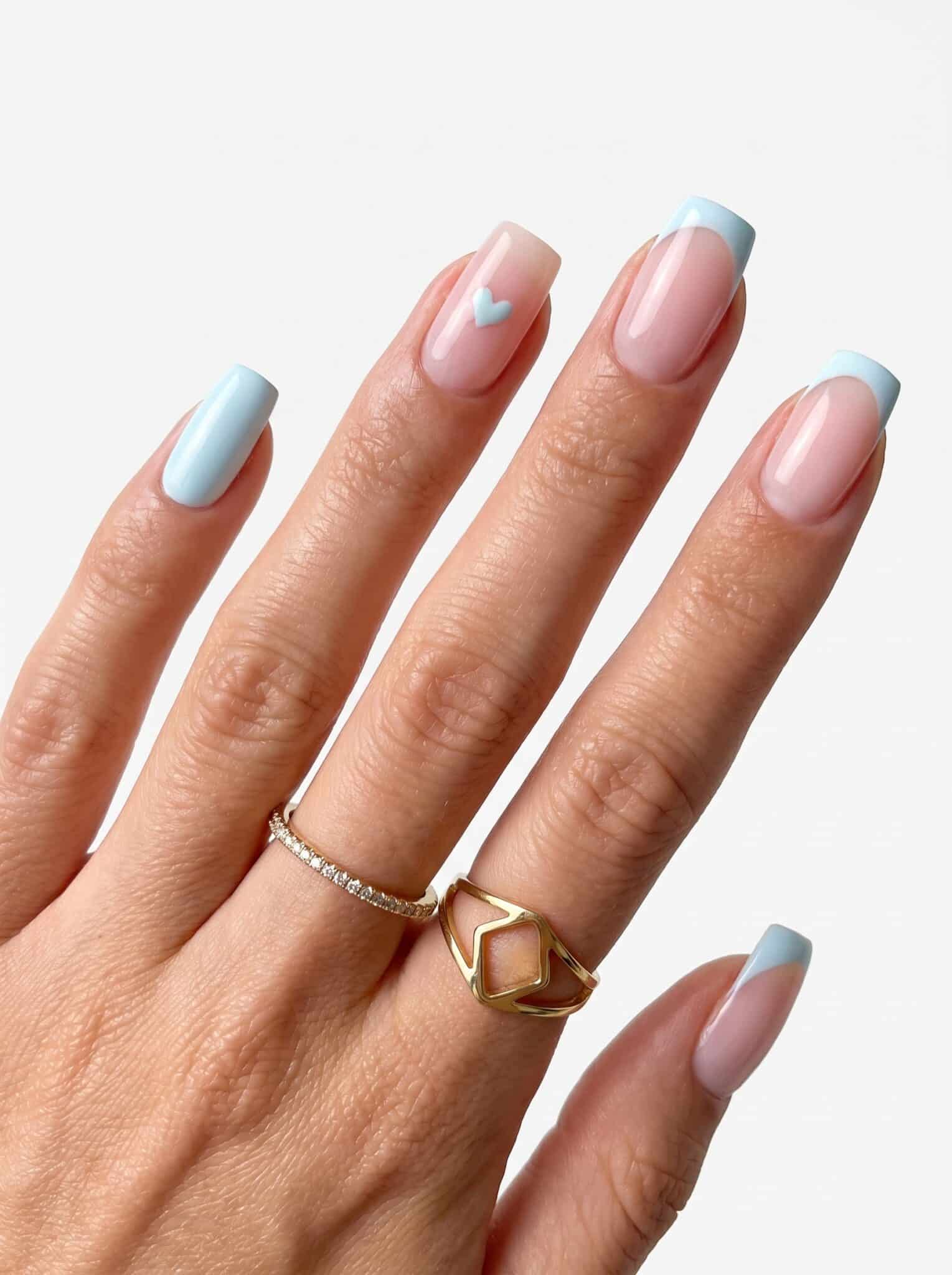 Nude almond nails with fine cobalt blue micro French tips