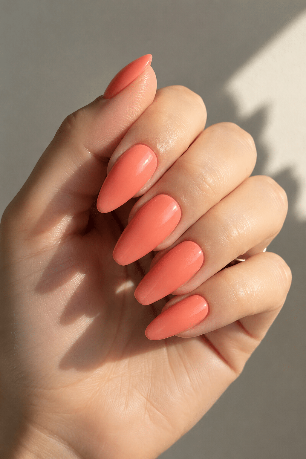 Coral French wave nails with a playful summer accent design