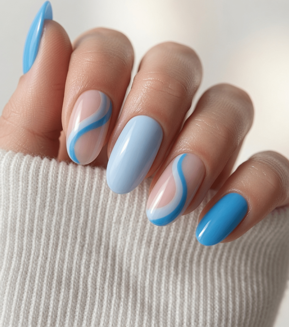 Glossy blue vacation nails with smooth wavy line art
