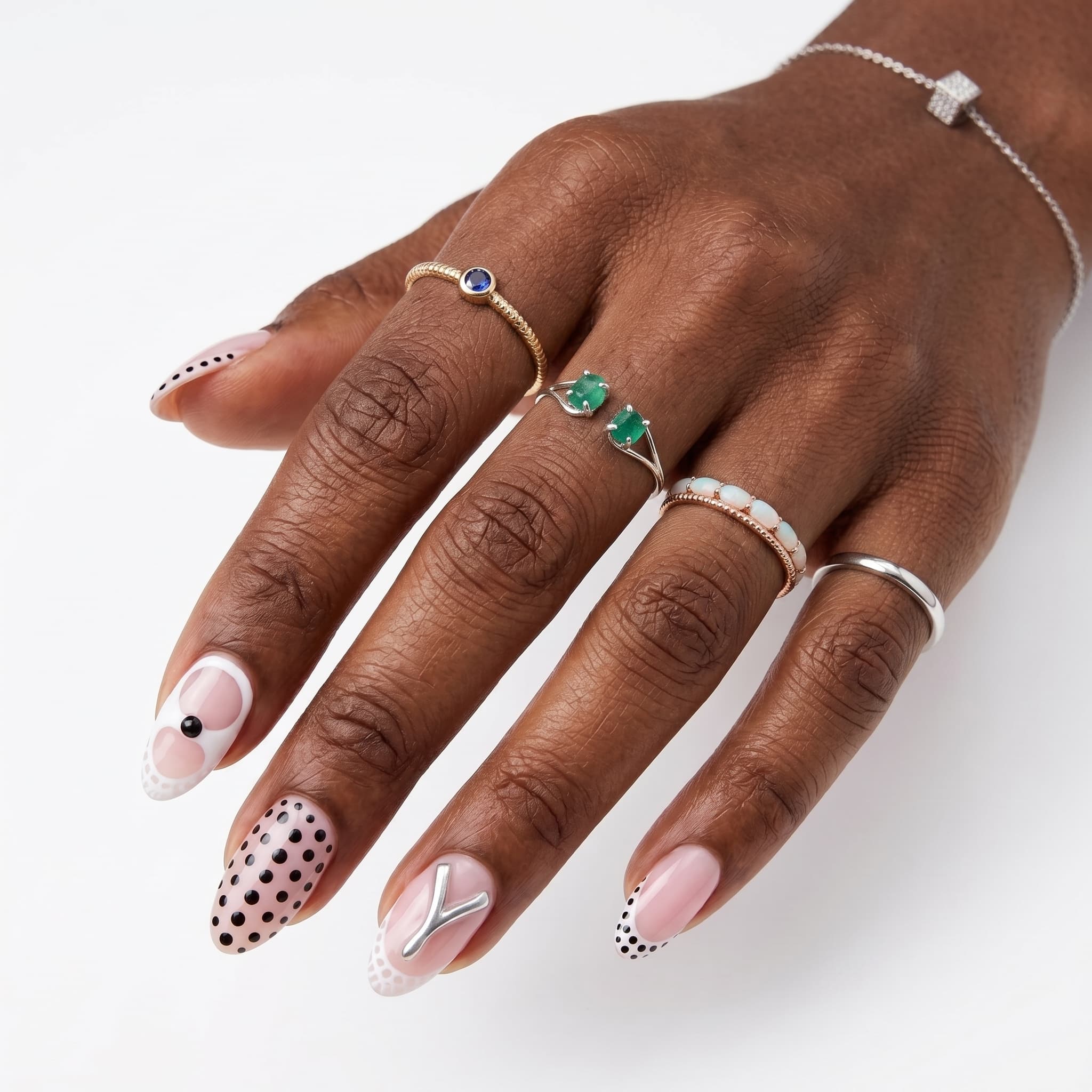 Glossy nude almond nails with a clean natural finish