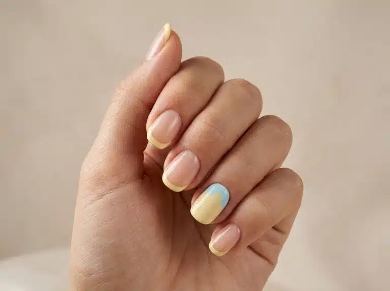 Summer Nail Ideas: 15 Looks for Every Summer Mood 11 Lemon yellow summer nails with a glossy butter yellow almond manicure
