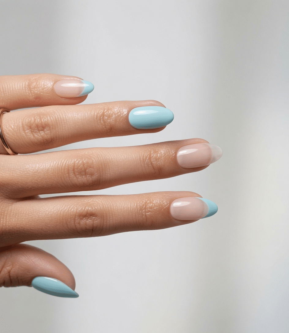 Soft light blue summer nails with a minimal wave accent