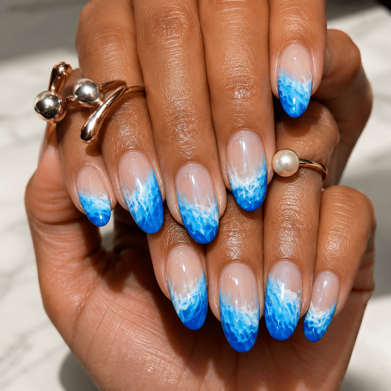 Light blue summer nails with a clean glossy manicure finish