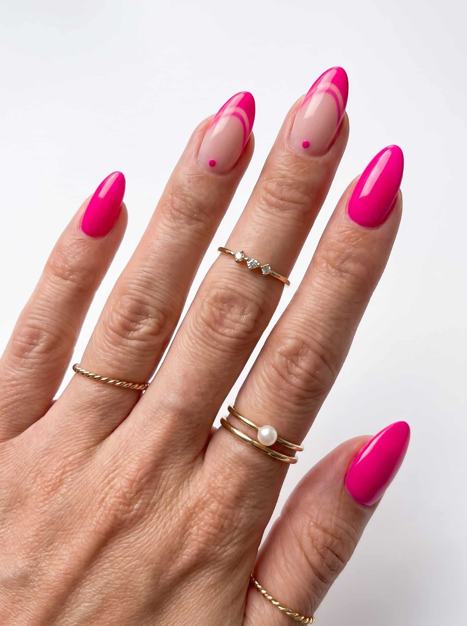 Light pink almond nails with a glossy natural finish