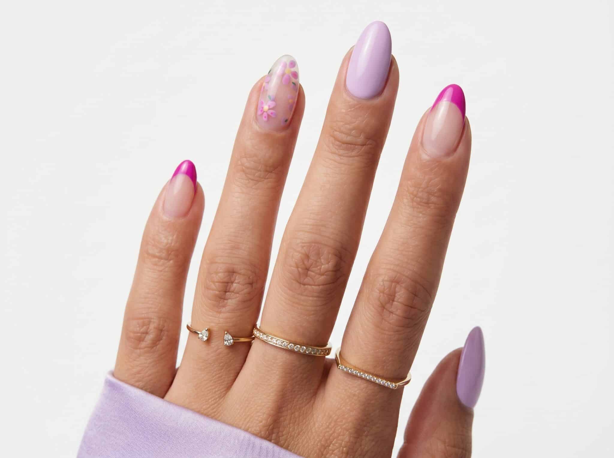 Glossy almond nails in bright pink and magenta summer shades