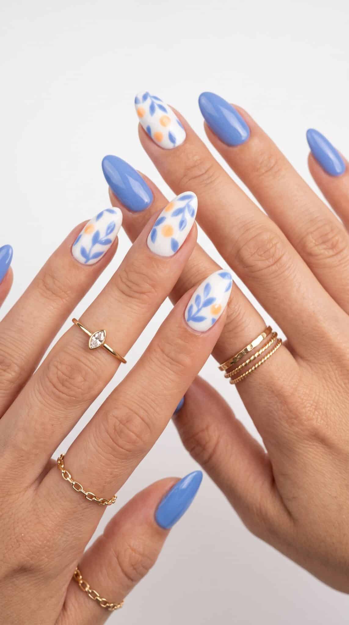 Pink summer nails with star accent details on a glossy nude base