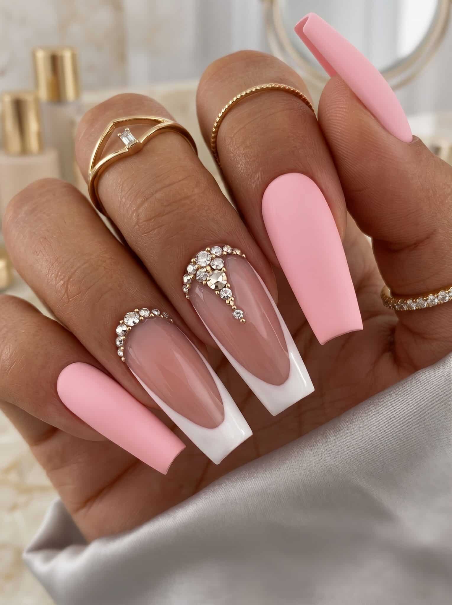 Two hands with glossy peach nails in a soft salon-style summer manicure