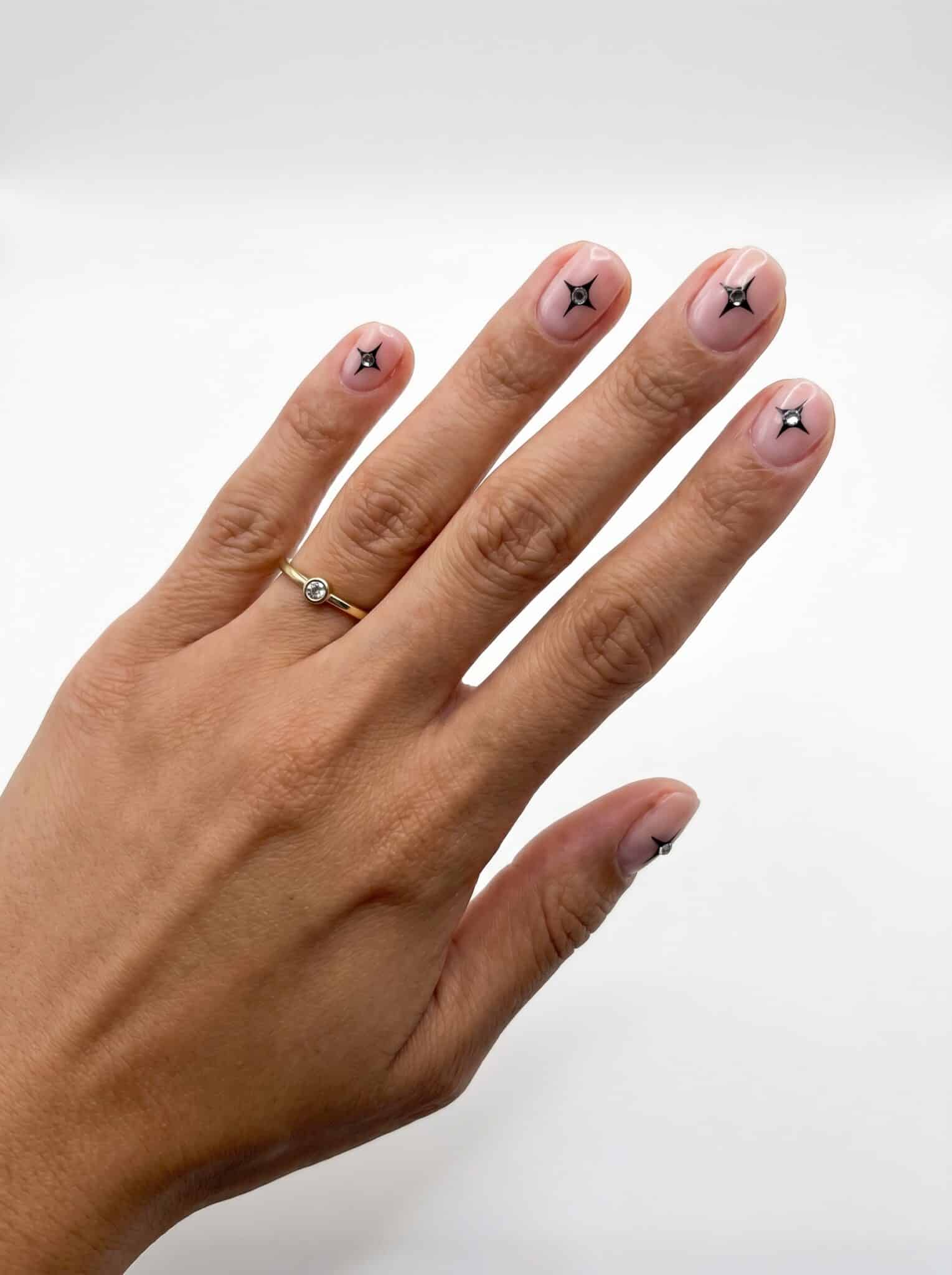 Soft pink almond nails with a glossy clean-girl finish