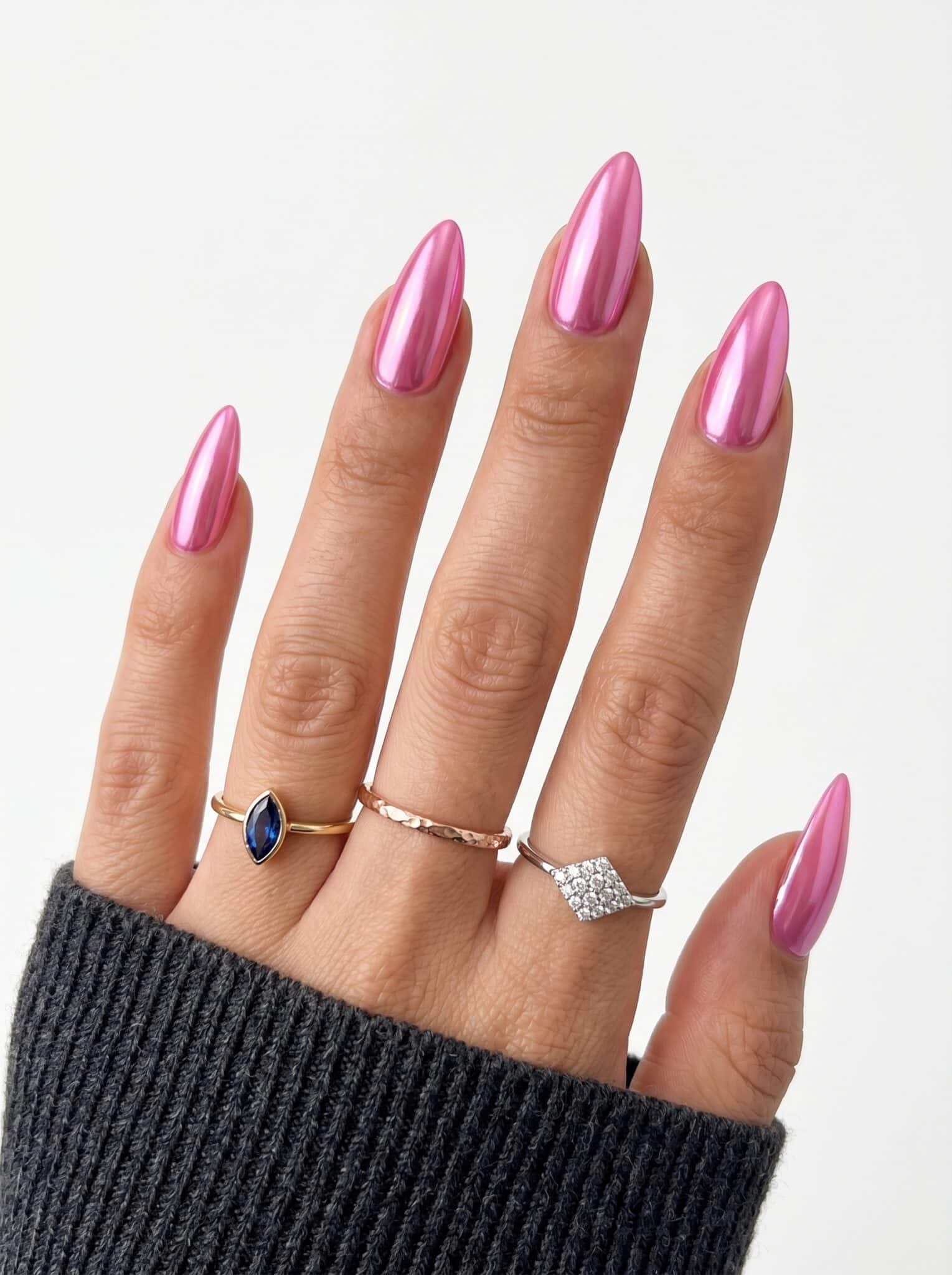 Soft pink almond nails with a glossy gradient-style finish