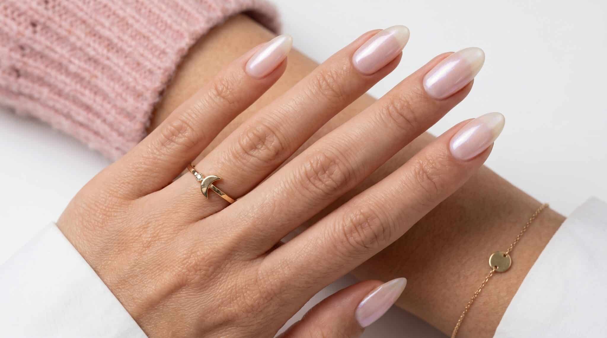 Sheer soft pink nude nails with a high-shine lipgloss finish