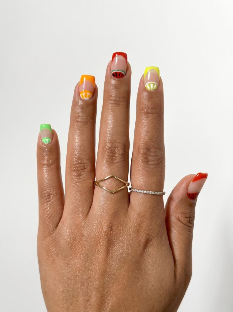 Short nails with tropical green yellow orange and red French tips