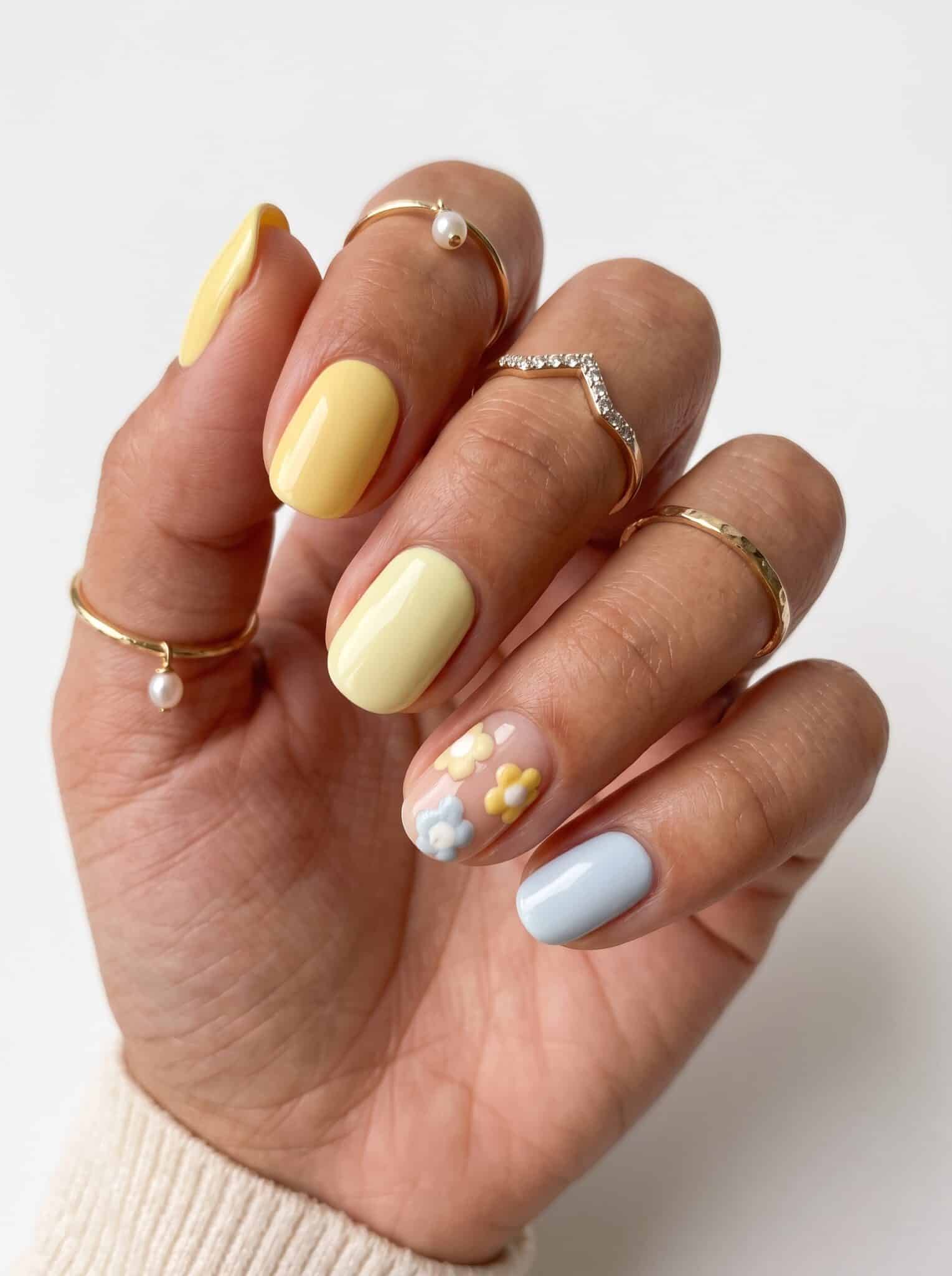 Yellow and white glossy summer nails with a clean sunny finish