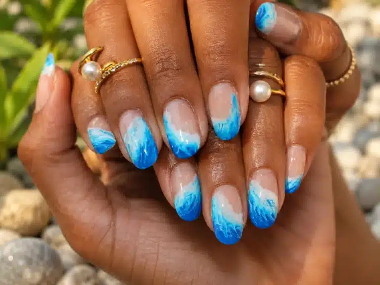 Summer beach nail inspo with blue ocean ombre and pearl details