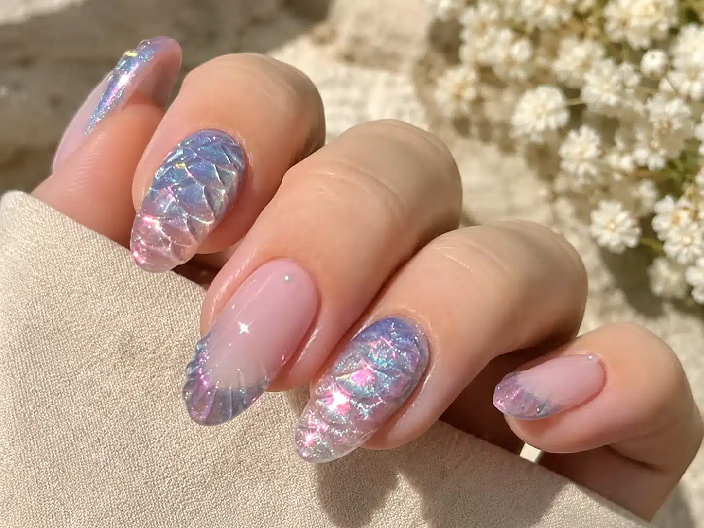Summer Beach Nail Inspo: 11 Mermaid Manicure Ideas 2 Pink seashell beach nails with iridescent glitter