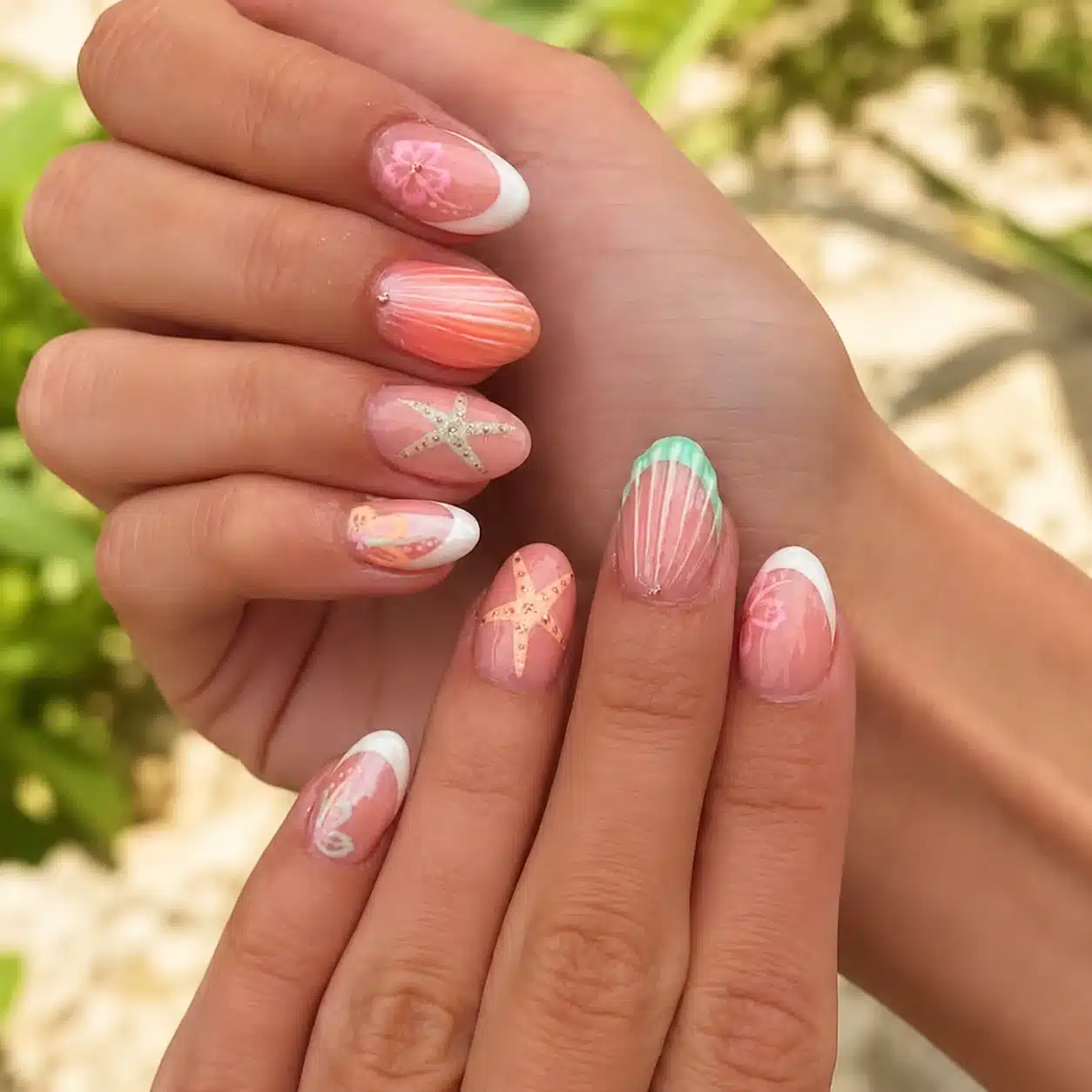 Summer Beach Nail Inspo: 11 Mermaid Manicure Ideas 4 Pink pearl beach nails with a glossy finish