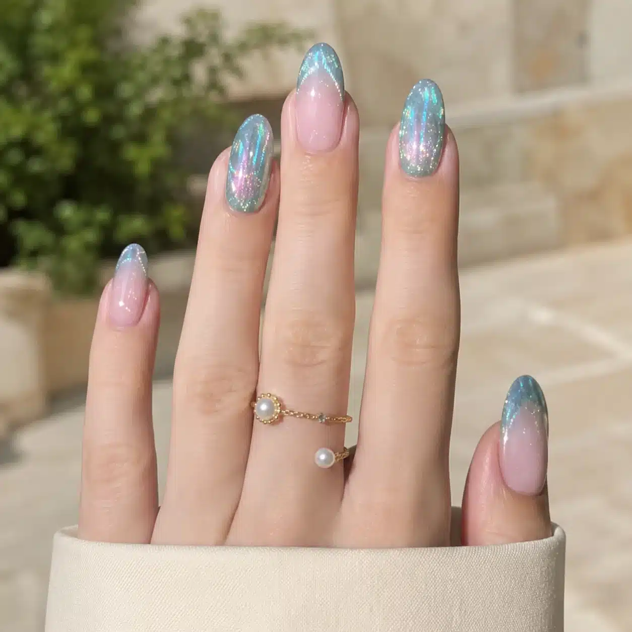 Summer Beach Nail Inspo: 11 Mermaid Manicure Ideas 6 Icy blue mermaid nails with chrome shine