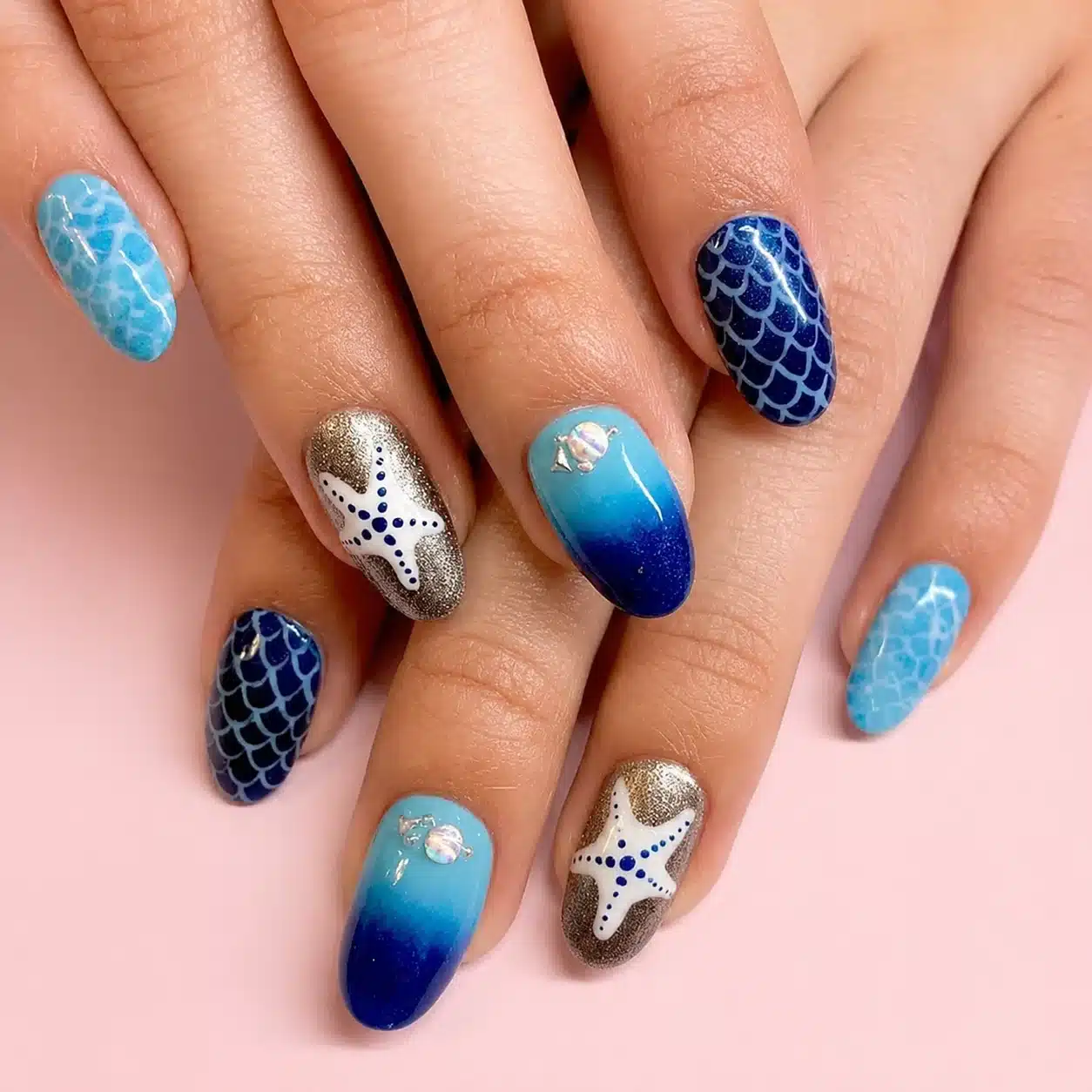Blue seaside summer nails with starfish nail art
