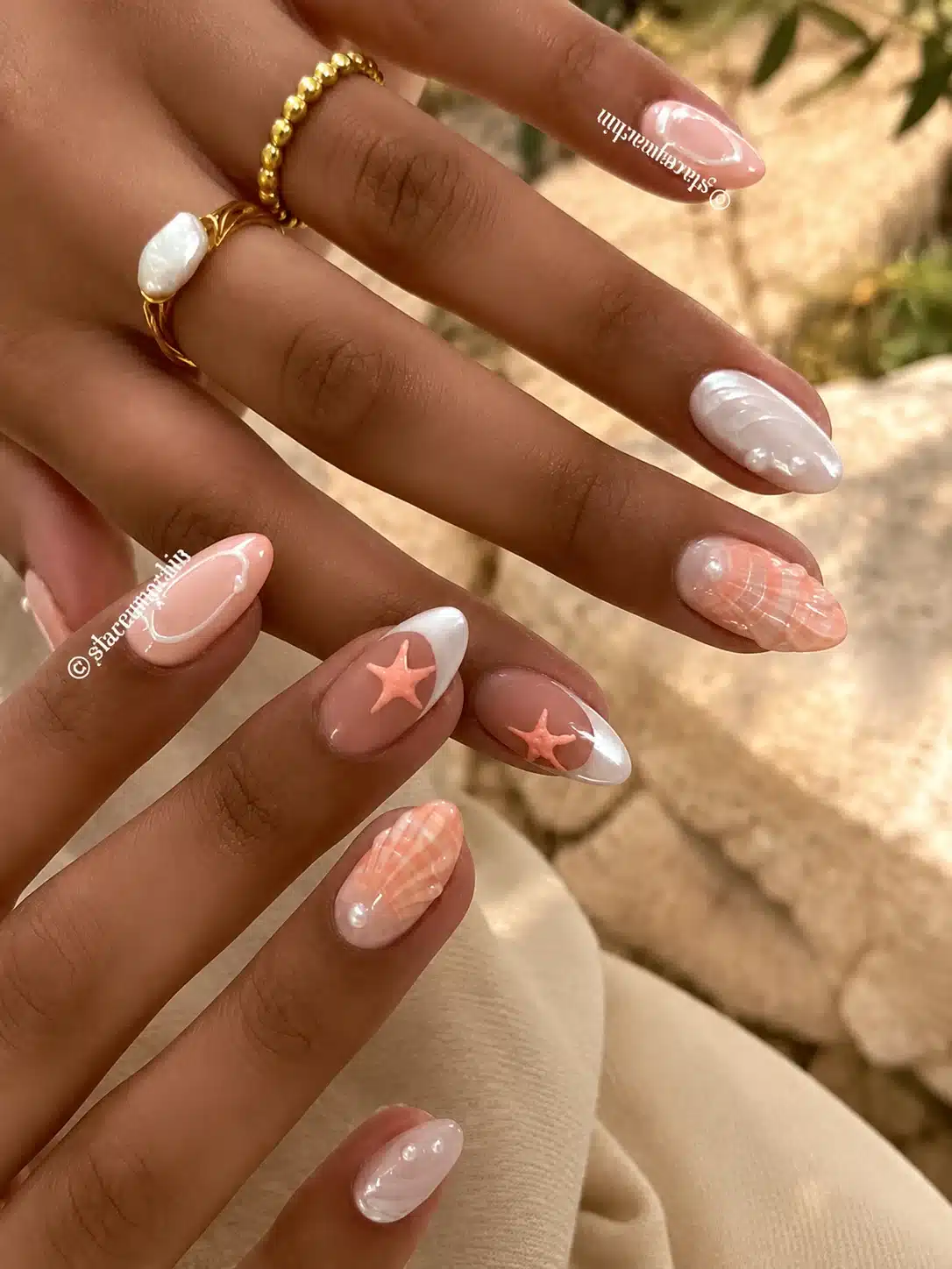 Summer Beach Nail Inspo: 11 Mermaid Manicure Ideas 10 Sandy neutral beach nails with a glossy nude finish