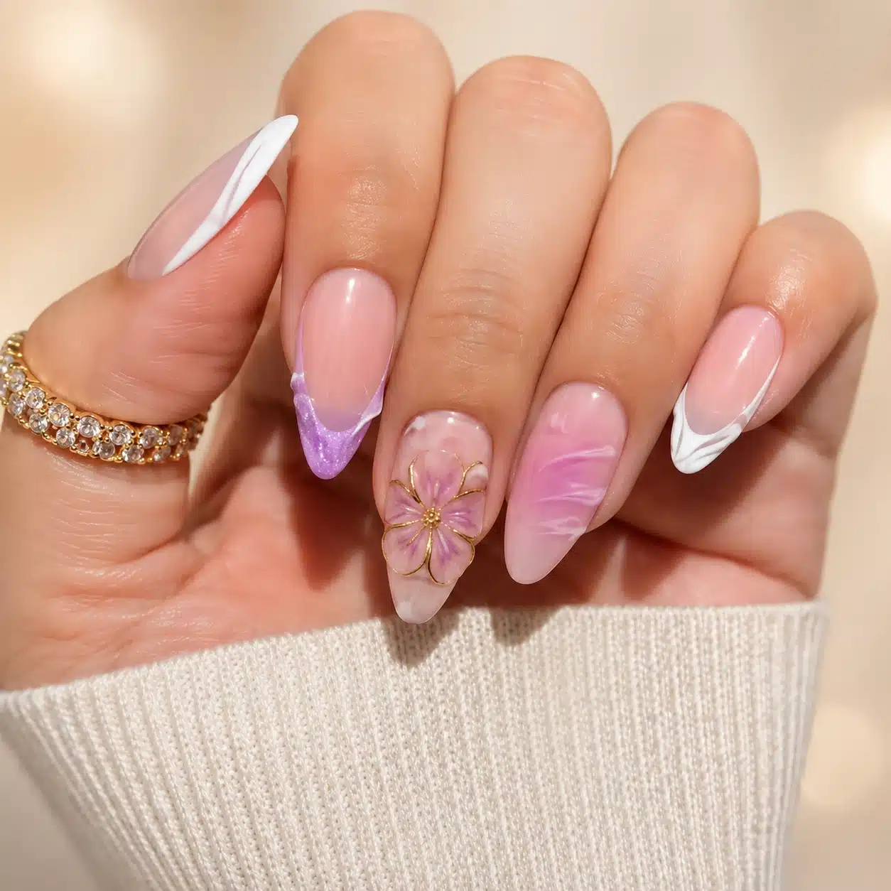 Almond nails with 3D floral summer details