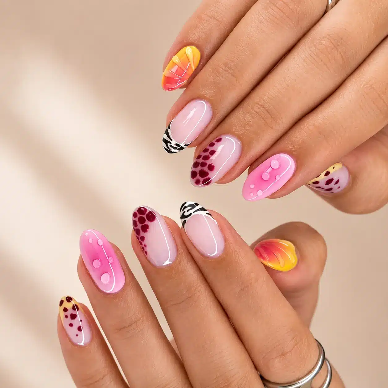 Mixed almond nail art with bright summer details