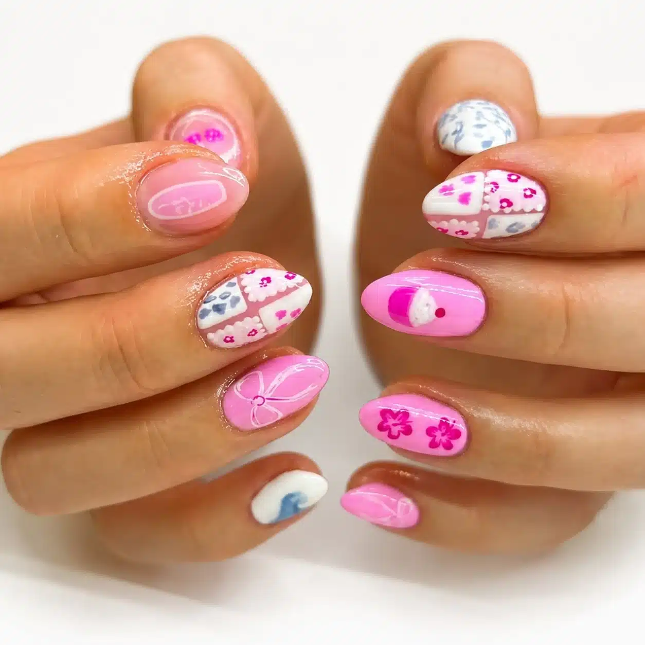 Birthday icon nail art with pink party details