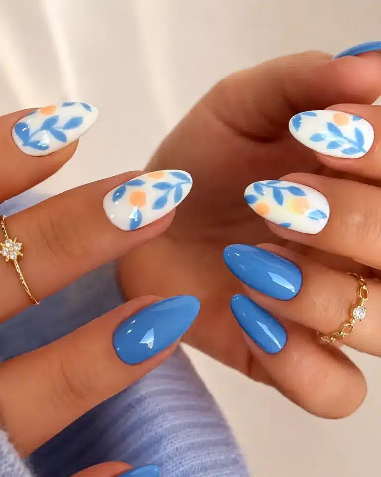 Cute easy summer nail inspo with blue floral mix and match nails
