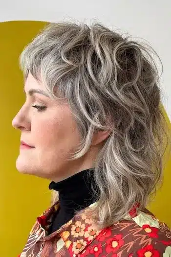 Pixie Haircuts for Women Over 60 With Fine Hair - Medium-Length Wavy Shag With Highlights Hairstyle
