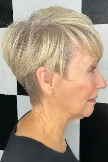 Choppy Blonde Pixie With Brow-Skimming Bangs