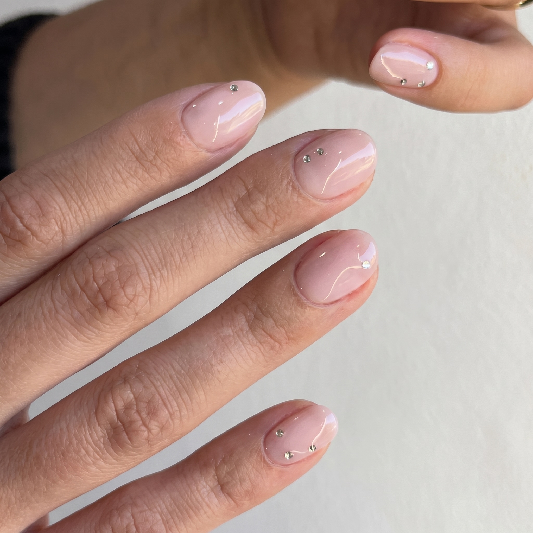 barely there french nails with slim white tips and neutral square shape