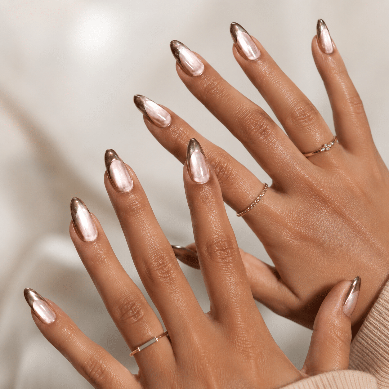 Bronze chrome summer nails with a reflective metallic glow