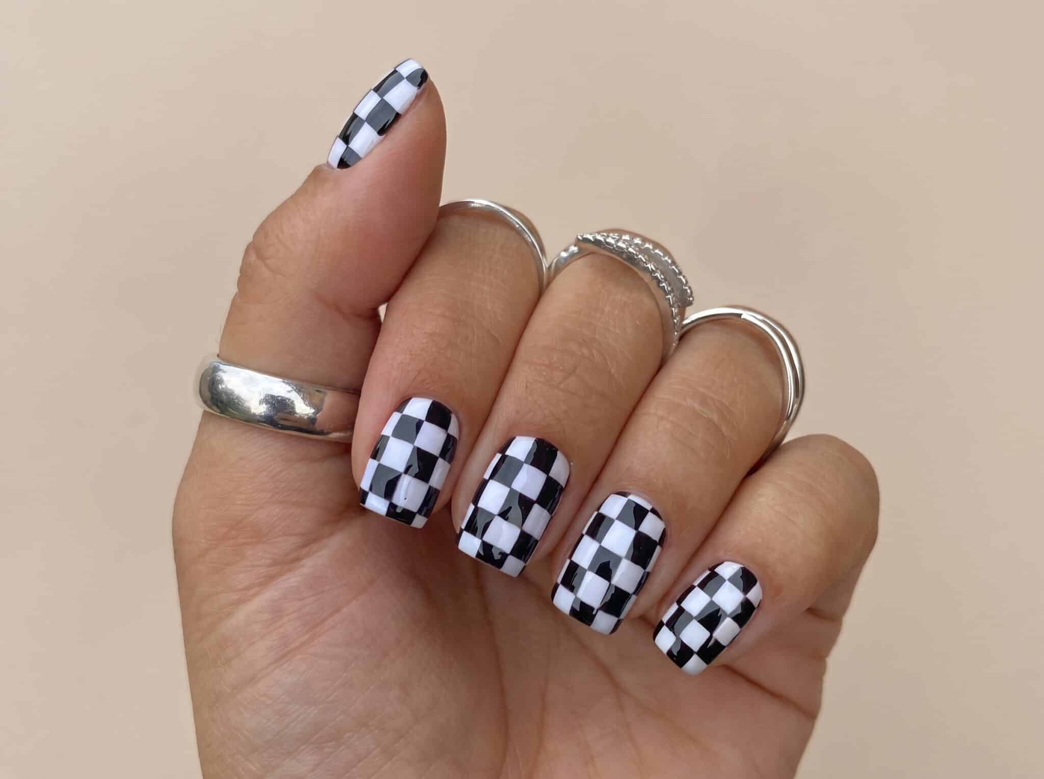 bubblegum pink back to school nails with glossy square manicure finish