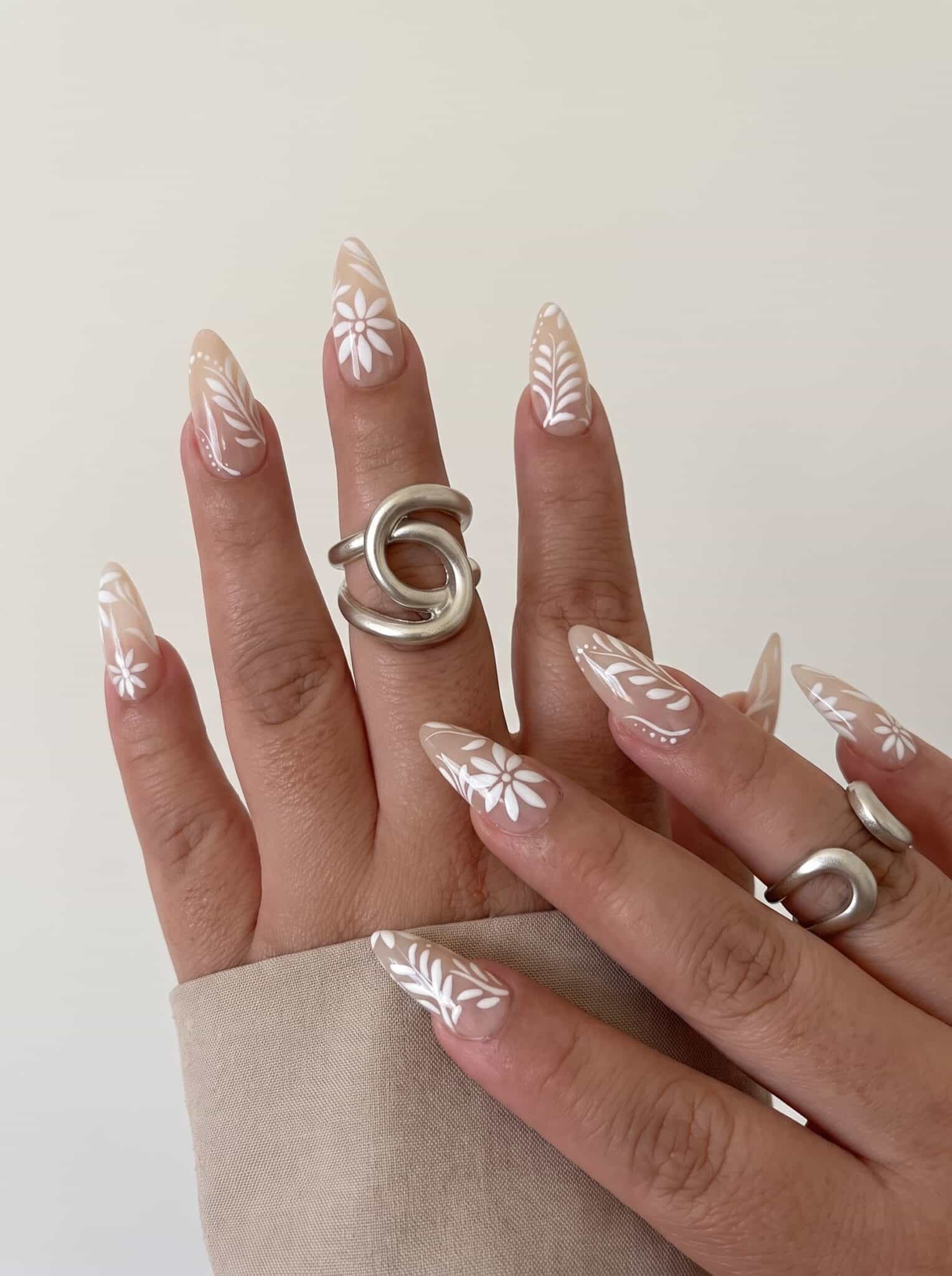 neutral nail ideas for summer with eggshell chrome nails and pearly cream finish