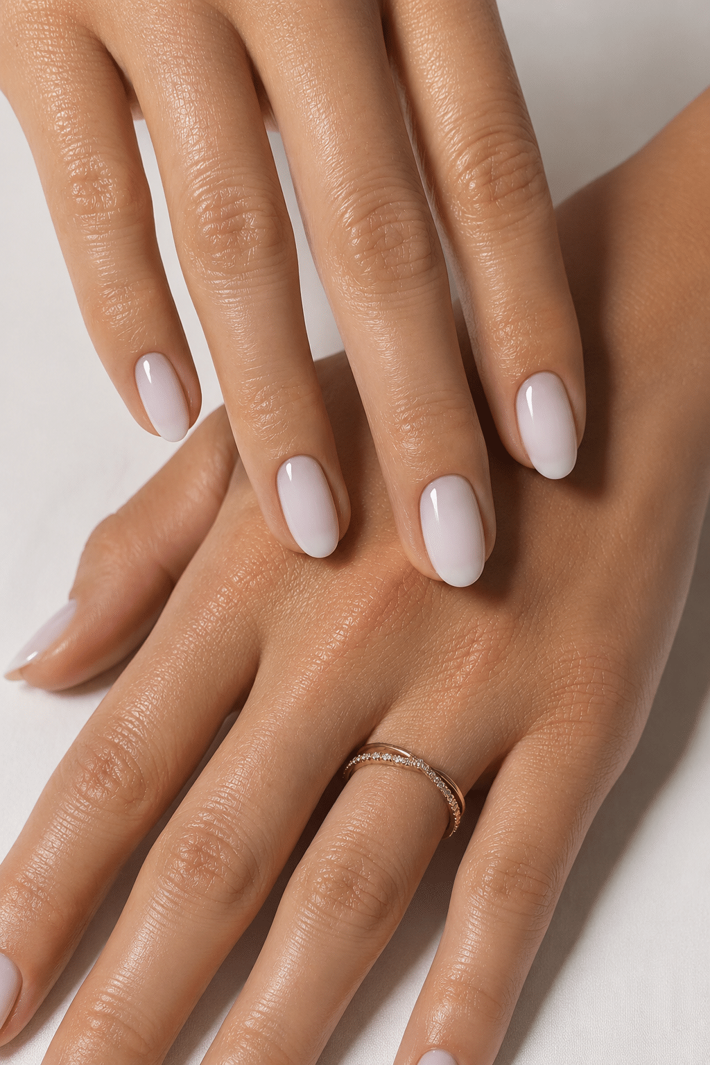 Milky white classy summer nails 2026 with a clean glossy finish