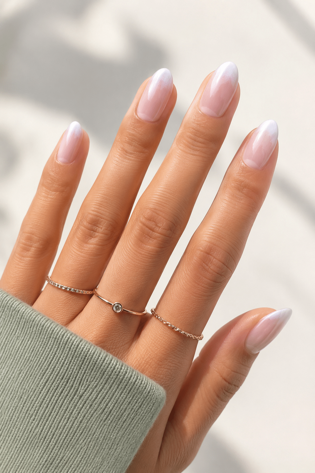 Milky white summer acrylic nails 2026 with clean glossy manicure finish