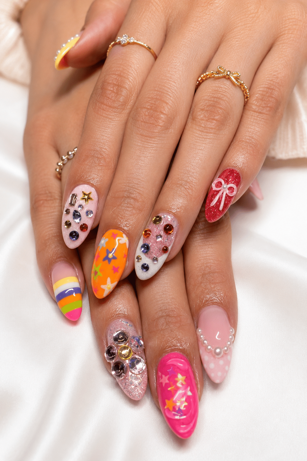 Mixed summer trend nails with colorful playful nail art details