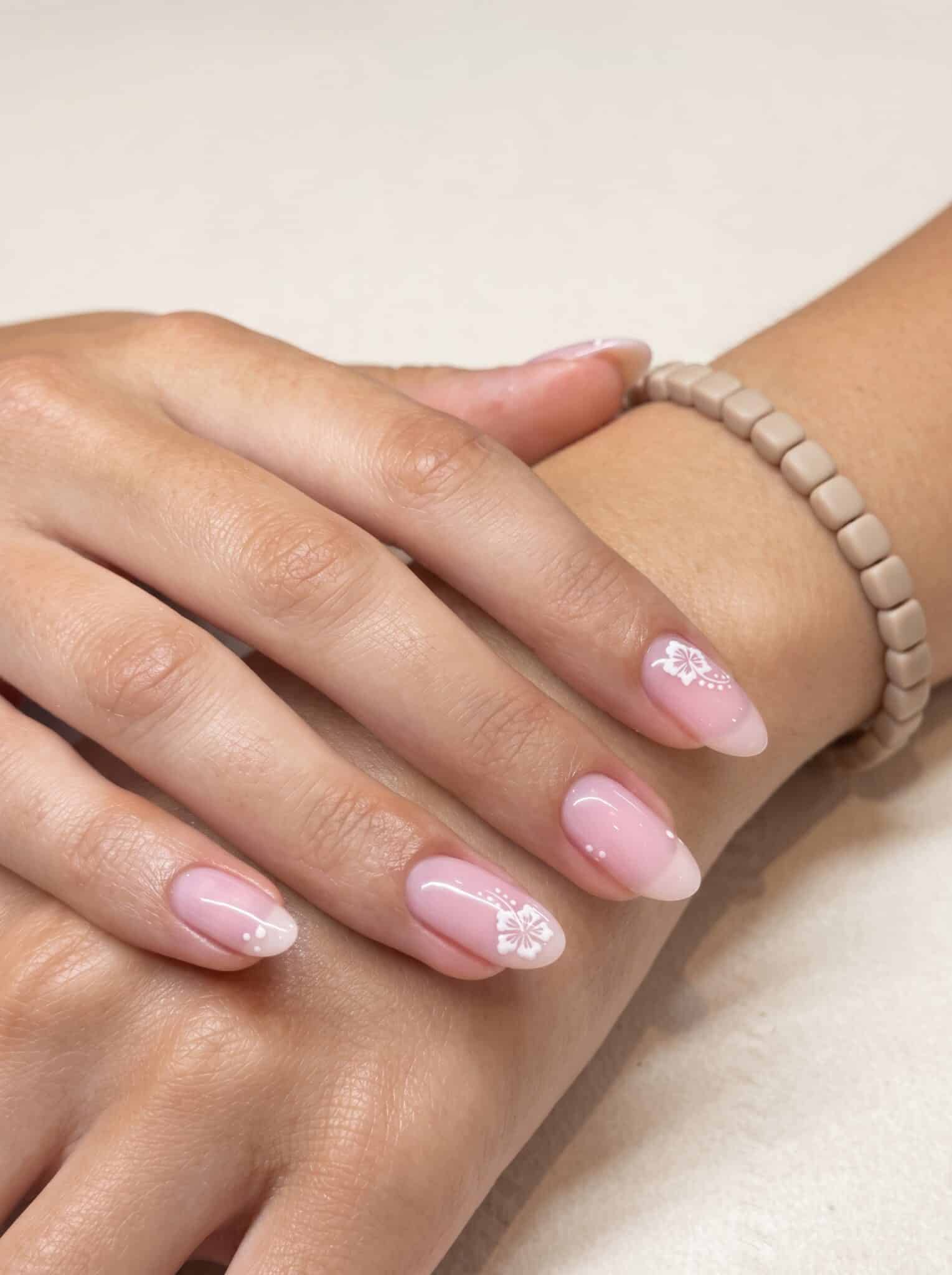 naked nails with sheer pink polish and glossy natural summer manicure