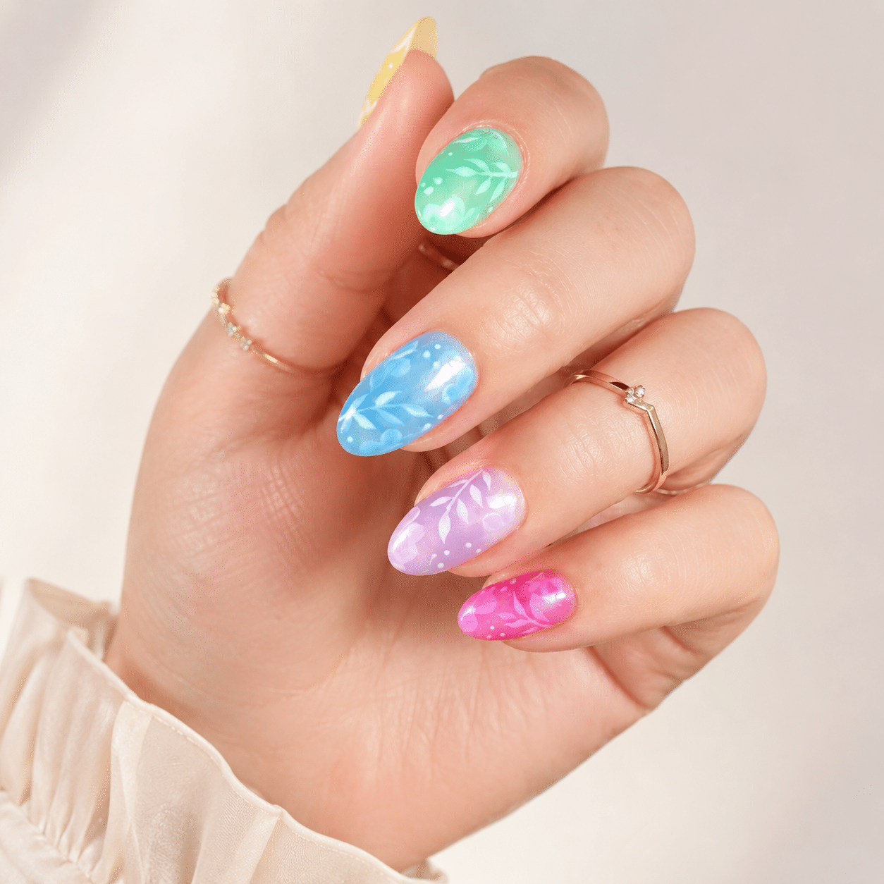 Pastel sorbet summer nails in playful multicolor shades for summer 2026