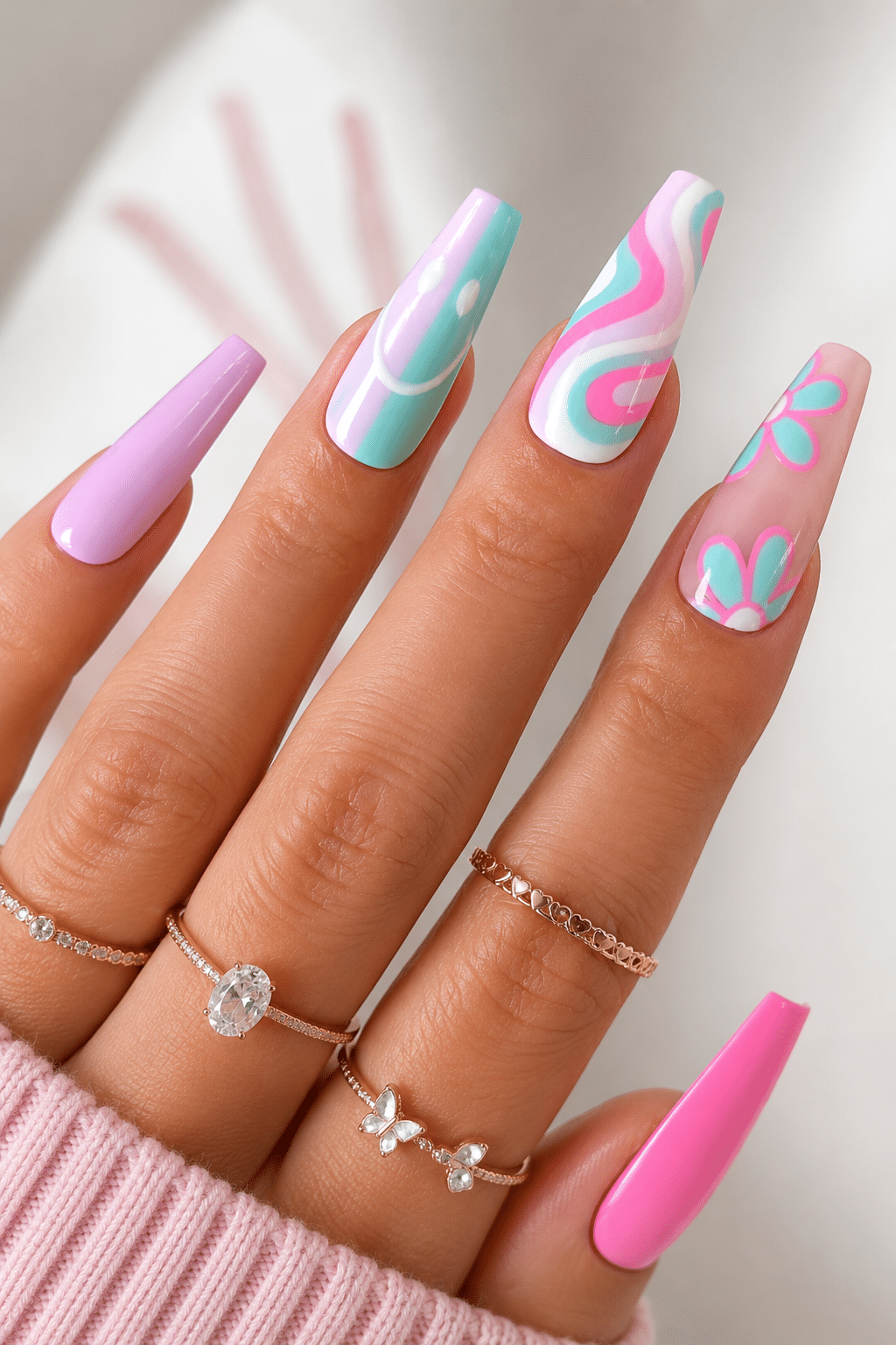 Pink blue swirl summer acrylic nails 2026 with glossy abstract nail art