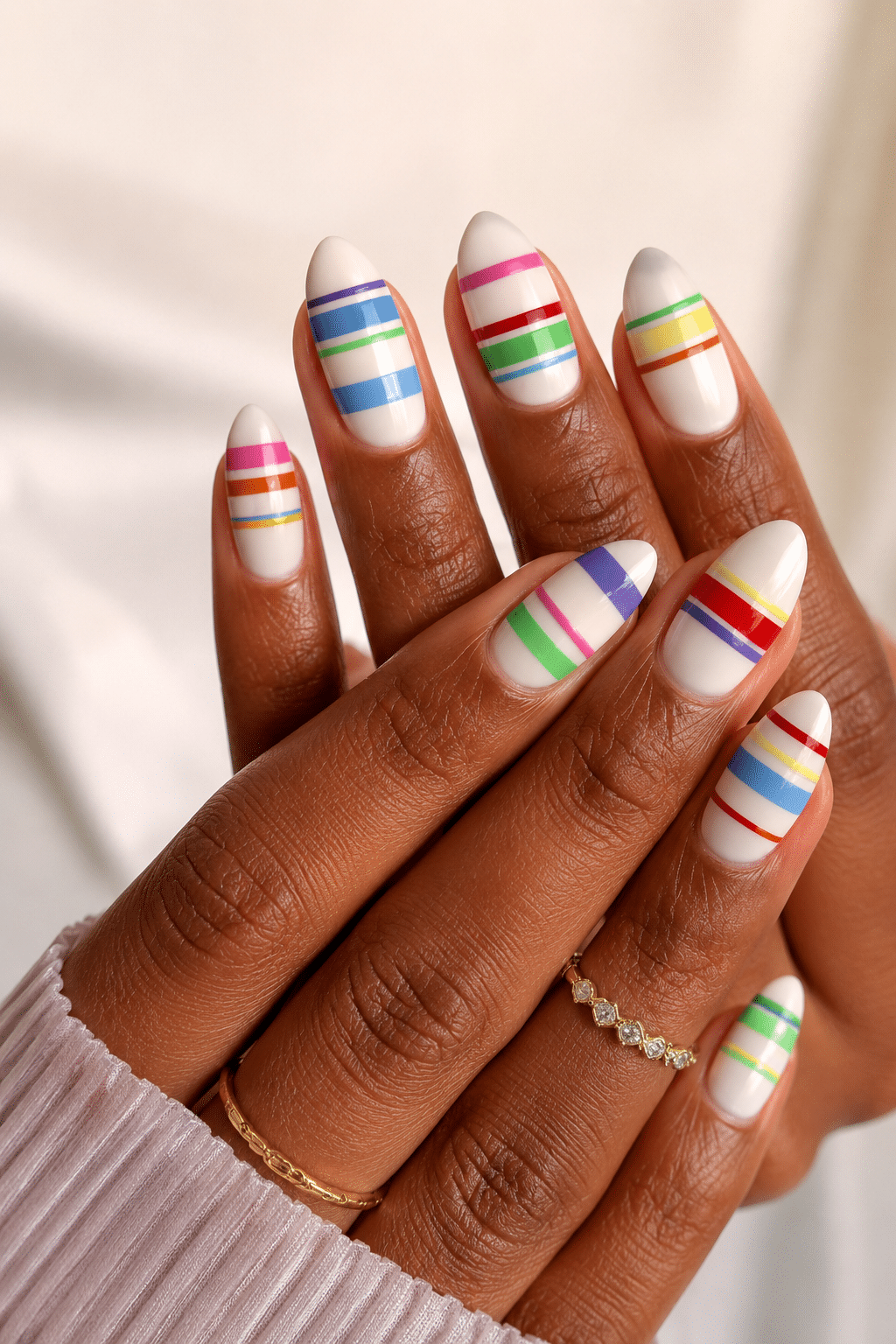 Rainbow stripe summer acrylic nails 2026 with colorful glossy line art