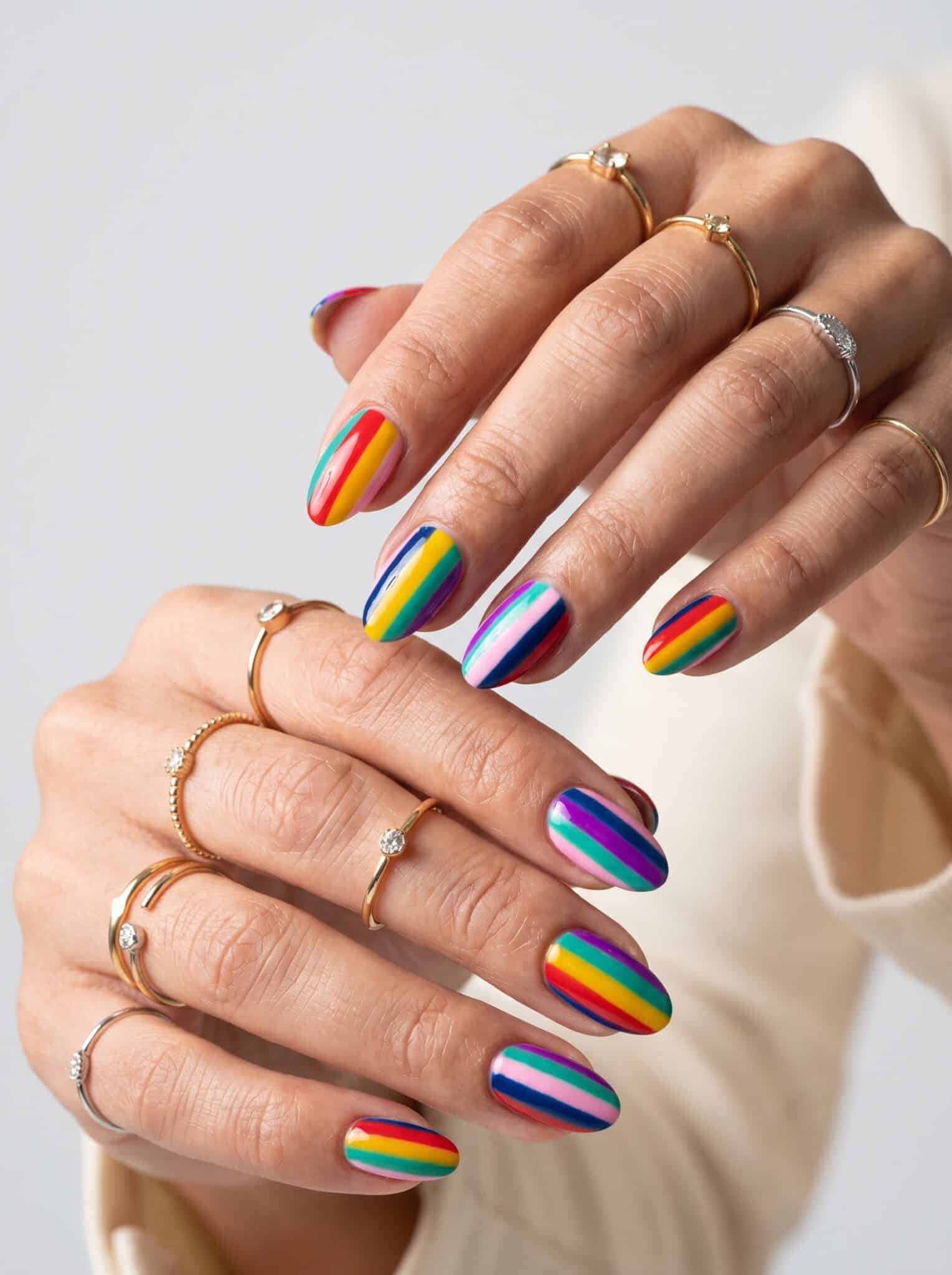 Rainbow stripe summer nails with bold vacation colors