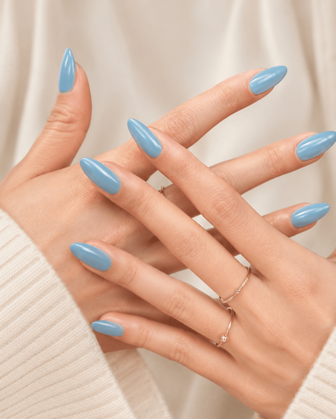 Sea glass blue summer nails with a glossy cool-toned finish