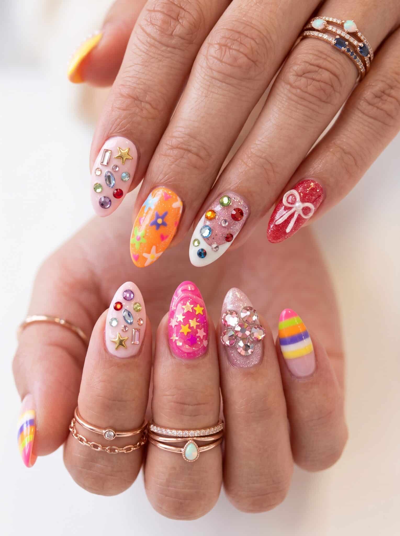 Metallic chrome nail designs summer 2026 with dimensional silver and gold shine