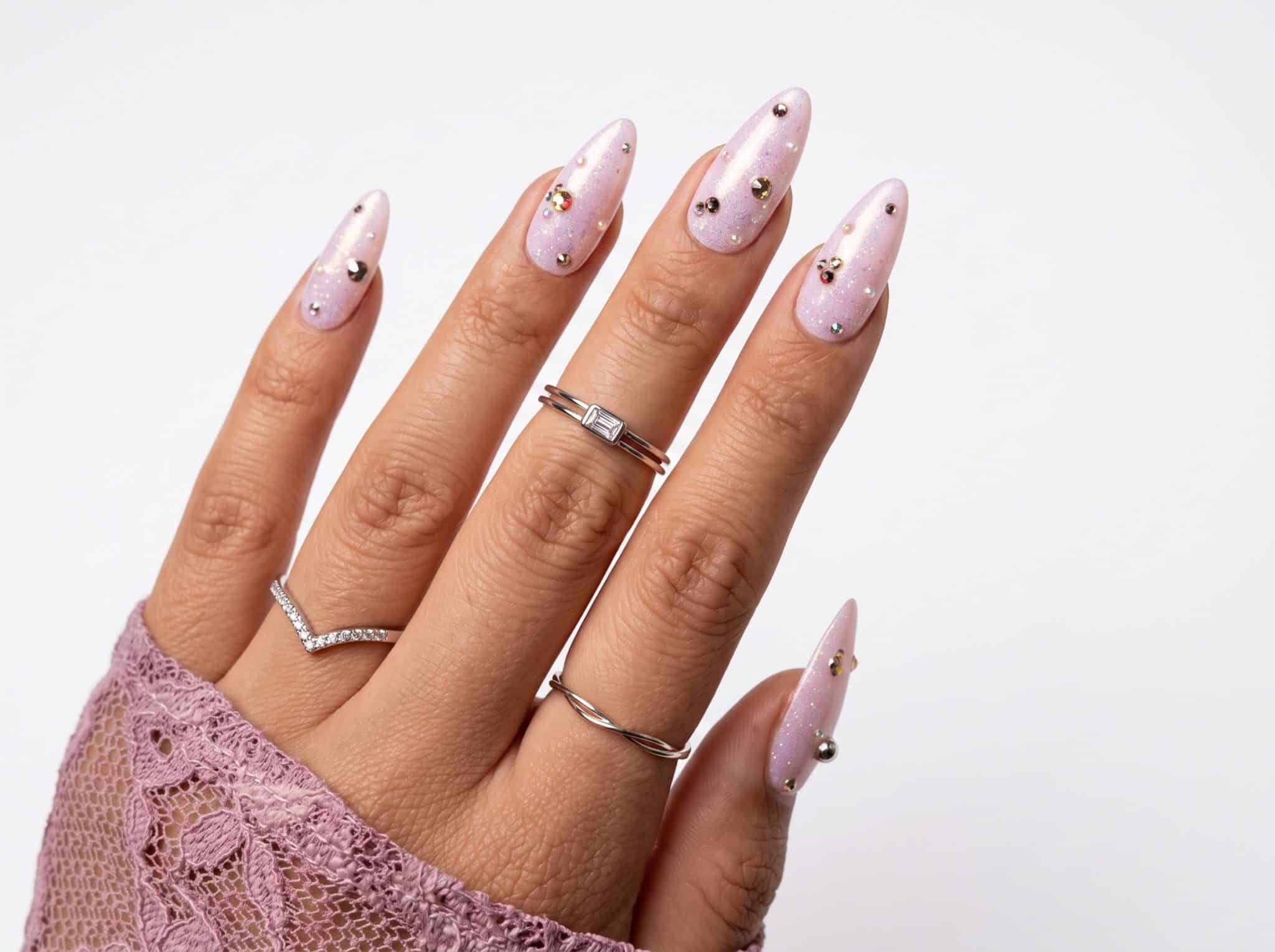 Milky blue glossy French nails with a soft translucent finish