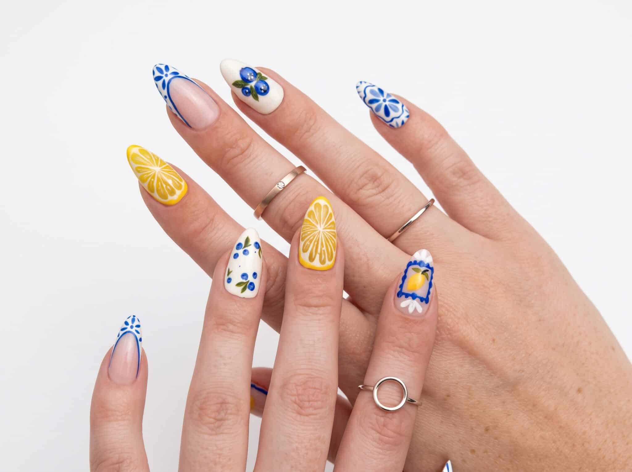 Pastel rainbow glossy nails with soft colorful summer accents