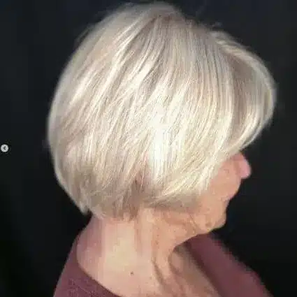 34 Elegant Short Hairstyles for Women Over 70 with Fine Hair 22 Short Hairstyles for Women Over 70 With Fine Hair - Champagne Blonde Layered Bob Hairstyle