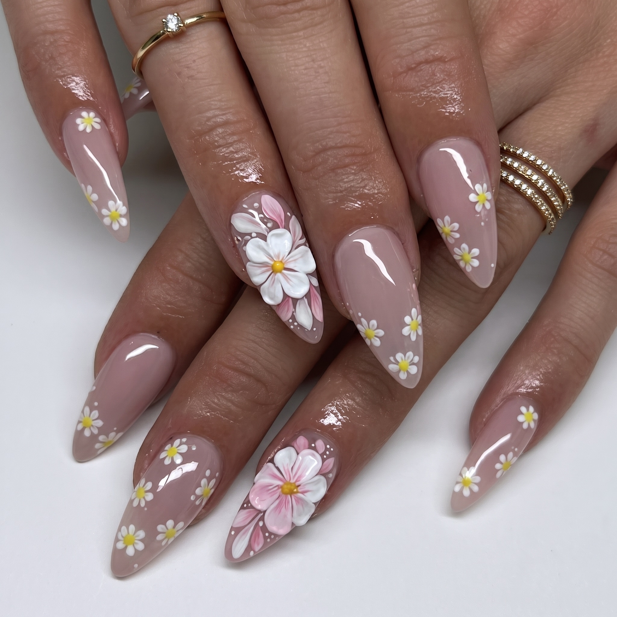 Soft pink summer nails with minimal flower accent details