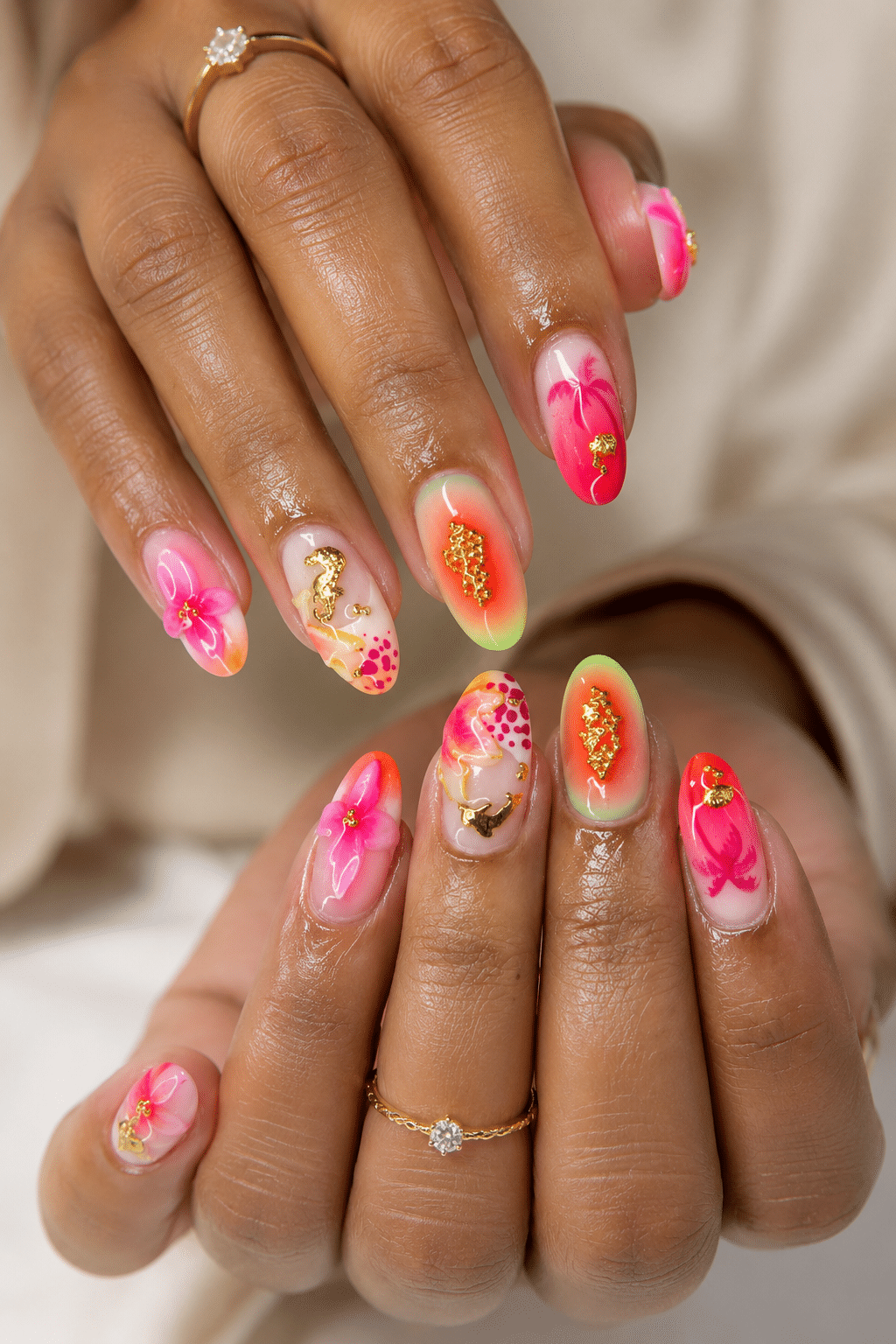 summer gel nails 2026 with bright pink fruity nail art and glossy gel shine