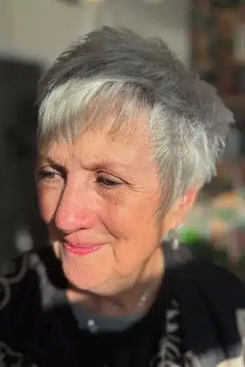 Silver Layered Pixie With Side-Swept Fringe